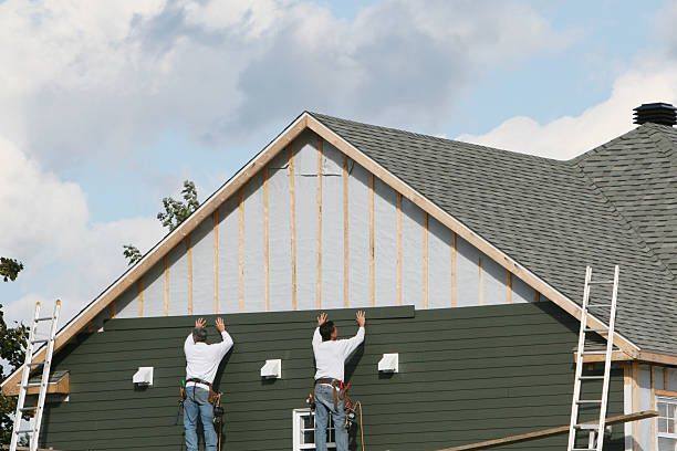 Professional Siding technician working in Midlothian, VA